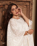 off-white abaya with a wide, flowing silhouette