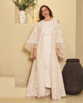 A luxurious beige abaya with a wide, flowing silhouette